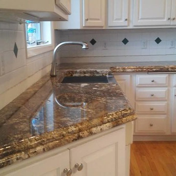 Carnaval Granite on White Cabinets