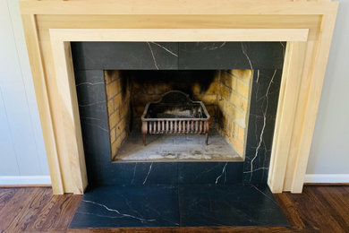 Finished with black marbled tile.