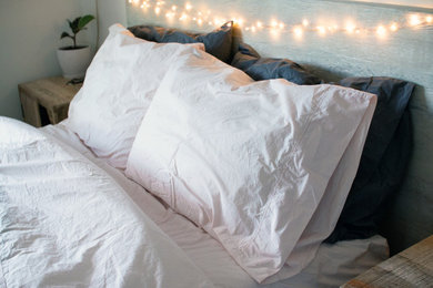 Example of a farmhouse bedroom design in Other