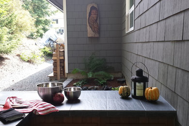 Arts and crafts patio photo in Seattle
