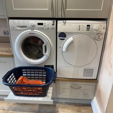 Raised washing machine and dryer.