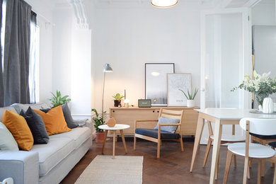 Design ideas for a small scandi formal living room in Valencia with white walls, dark hardwood flooring, no fireplace, no tv and brown floors.