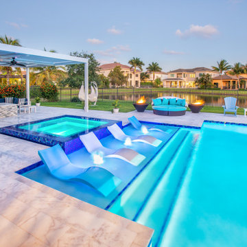 New Swimming Pool and Spa With Custom Van Kirk Built Fire Bowls In Boca Raton!
