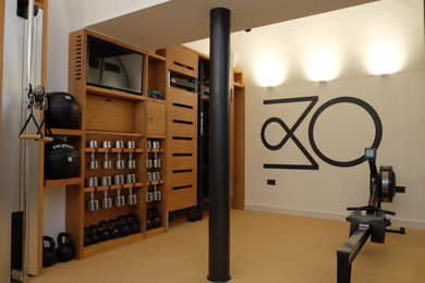 This is an example of a small contemporary home gym in London.