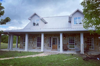 Rustic exterior home idea in Dallas