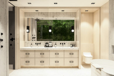 Inspiration for a large contemporary master marble tile marble floor, white floor and double-sink bathroom remodel in Vancouver with flat-panel cabinets, light wood cabinets, a wall-mount toilet, white walls, an undermount sink, marble countertops and a floating vanity