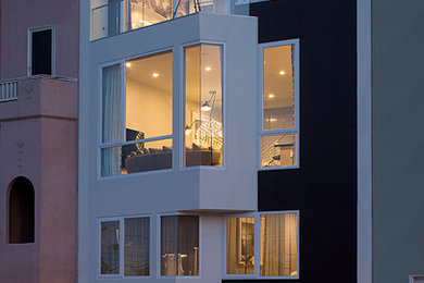 Small trendy three-story mixed siding exterior home photo in San Francisco