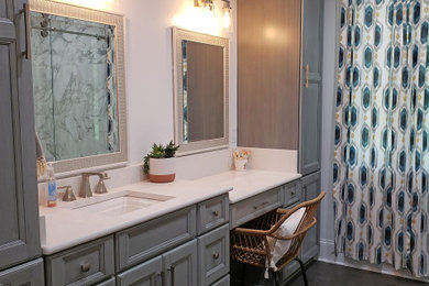 Example of a mid-sized transitional kids' white tile and porcelain tile porcelain tile, gray floor and single-sink bathroom design in Nashville with flat-panel cabinets, gray cabinets, a two-piece toilet, white walls, an undermount sink, quartz countertops, white countertops and a built-in vanity