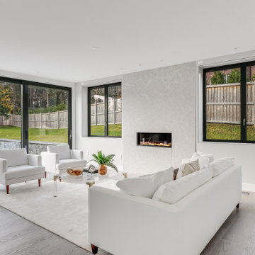 Sleek Modern Luxury Home Renovation with High-End Finishes and Contemporary Open