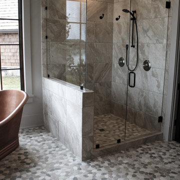 Master Bath Featuring Pebble Tiled Floors