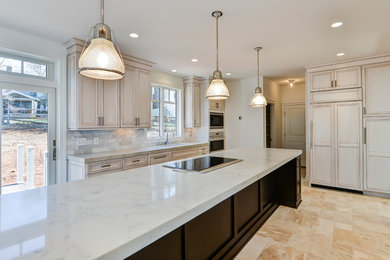 Example of a large trendy single-wall travertine floor eat-in kitchen design in Los Angeles with a single-bowl sink, recessed-panel cabinets, white cabinets, marble countertops, white backsplash, stone tile backsplash, stainless steel appliances and an island