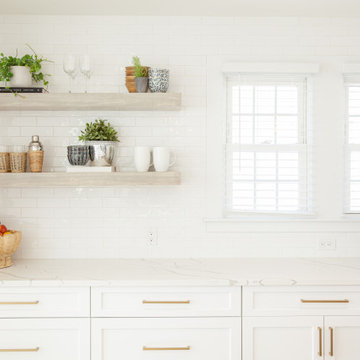 All White Transitional Kitchen with Herringbone Wood Floor