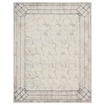 Nourison - Nourison Glitz 7'10" x 9'10" Ivory/Taupe Mid-Century Modern Indoor Area Rug - Transport your living room or bedroom to Hollywood's golden age with this Art Deco rug from the Glitz Collection. The abstract, marble-like pattern is framed by an ornate geometric border in blue and beige, enhanced with a subtly raised texture that adds visual intrigue. Finished with a glamorous sheen that shifts in different light, this contemporary rug is made from softly textured polyester.