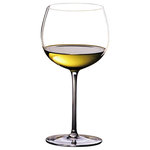 Riedel - Riedel Sommeliers Montrachet Wine Glass - The Montrachet appellation in Burgundy produces the world's finest and costliest dry white wines. Their centuries-old reputation is based on Chardonnay grown in the unique microclimate and soil of these vineyards and vinified according to classic techniques. These wines are monumentally complex and dense, with high levels of alcohol and moderate acidity. The wide mouth of this generously shaped glass steers the wine mainly to the sourness-sensitive edges of the tongue, ensuring that the acidity is sufficiently emphasised to create a harmonious balance with the luscious fruit of the late-harvest, healthy grapes and the sweet toasty aromas of the wines ageing in oak barrels. The size of the bowl allows space for the rich bouquet to develop its superbly diverse range of aromas, while minimising the risk of it becoming over concentrated. Of course, outstanding Chardonnays from other regions and countries can also be enjoyed from this glass.