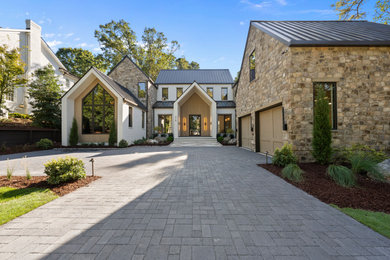 Example of a transitional exterior home design in Raleigh
