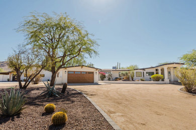Example of a cottage exterior home design in Phoenix