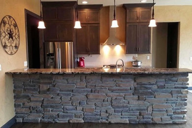 Arts and crafts kitchen photo in Other