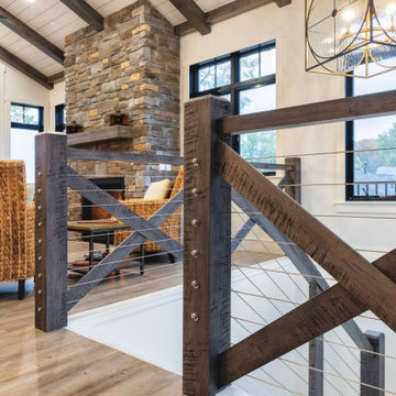 Elegant Farmhouse Interior with Rustic Mantle on Fireplace