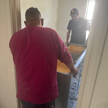 Custom Blue Vanity Installation in Progress
