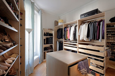 Photo of a contemporary storage and wardrobe in Paris.