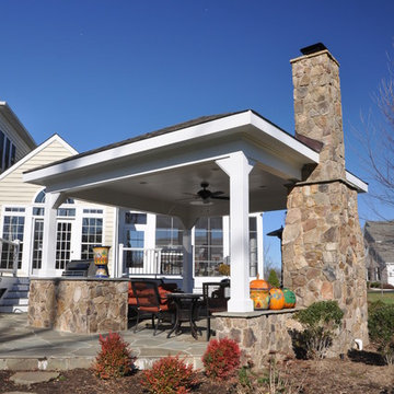 patio,pavilion,outdoor fireplace,indoor fireplace,grill,walkway,walls.