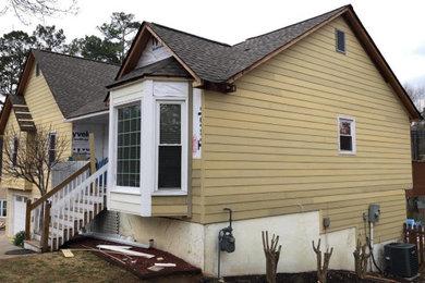Example of a large classic blue two-story concrete fiberboard exterior home design in Atlanta with a shingle roof