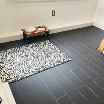 Plank tile Flooring and Penny tile Backsplash
