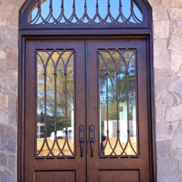 Luxe Craftsman Style Iron Door with Transom