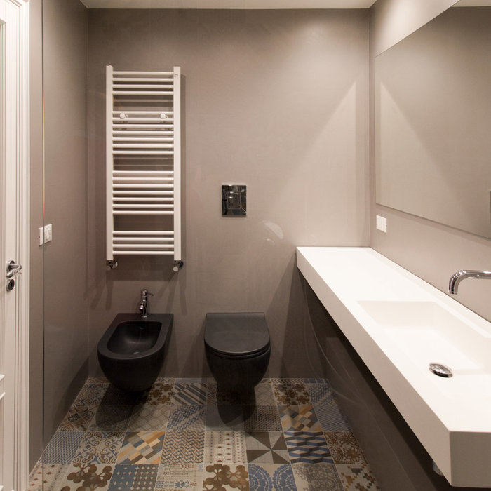 Foto di una stanza da bagno design con pavimento con piastrelle in ceramica e pavimento multicolore