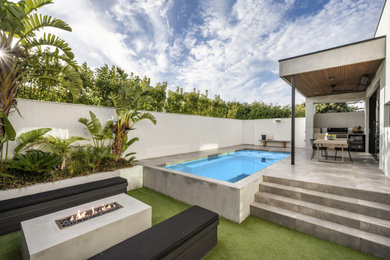 Medium sized contemporary back rectangular lengths swimming pool in Adelaide with concrete paving.