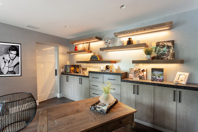 Example of a mid-sized mountain style home office design in Orange County