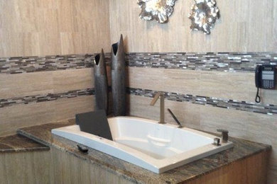 Mid-sized transitional master beige tile and porcelain tile porcelain tile and beige floor drop-in bathtub photo in Other with a two-piece toilet and beige walls