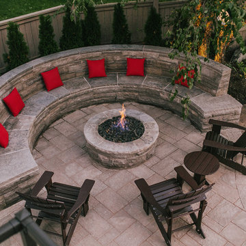 Interlock Patio with Natural Stone Bench and Firepit