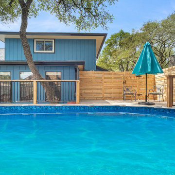 Pool Enclosure, privacy wall fence, stairs, and metal railing with cedar posts