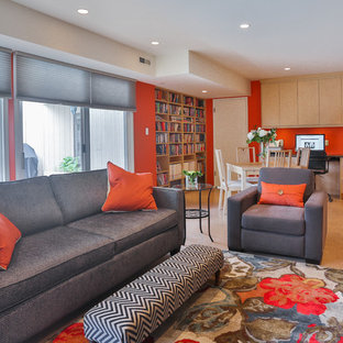Inspiration for a medium sized contemporary basement in Vancouver with a ribbon fireplace and red walls.