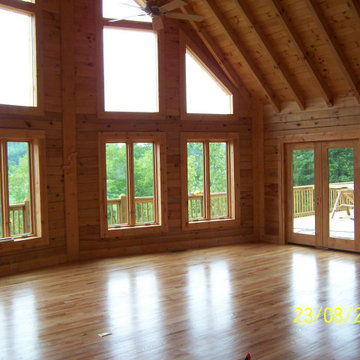 SCC Renovations Log home gable living room hardwood flooring FINISHED