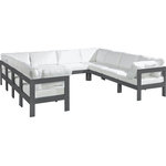 Meridian Furniture - Nizuc Water Resistant Patio U-Shaped Modular Sectional, White, 10-Piece: 6 Armless Chair, 4 Corner Chair, Dark Gray Aluminum Frame - Pick and choose your favorites from the Nizuc collection to create a modular seating group the whole gang will enjoy. The sturdy aluminum frame provides dependable support for friends and family as they relax and unwind, and the resilient white water resistant fabric stands up to the elements without losing its beautiful demeanor, so you can count on it lasting for the long haul. Latches beneath these seating pieces help you easily attach them to one another for convenient setup.