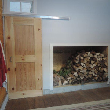 Coat Room, Built-in Firewood Storage, Barn Door entry