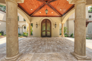 This is an example of a mediterranean entryway in Charlotte.