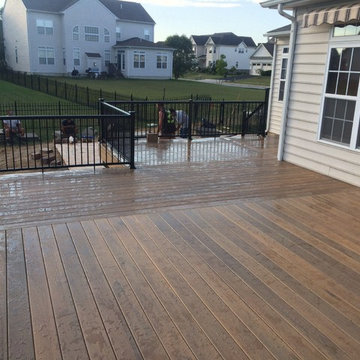 Timbertech legacy deck with aluminum rails with lighted post caps.