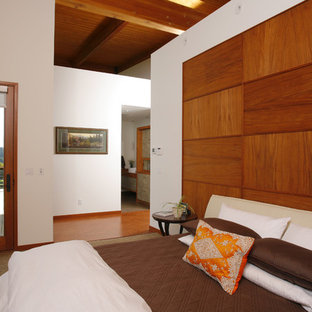 Inspiration for a modern bedroom remodel in Seattle with white walls