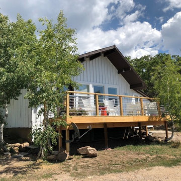 Shabby run down cabin reimagined to a Modern Steamboat cottage