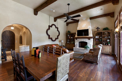 Tuscan family room photo in Dallas