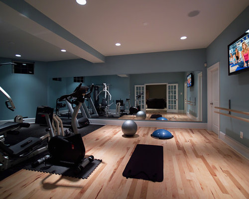 Modern Home Gym Melbourne Modern home gym idea in DC Metro with blue walls and light hardwood floors
