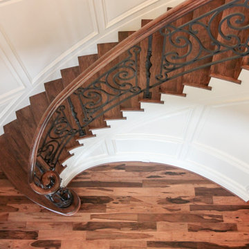 Project #74 | Circular Staircase with Hand-Forged Metal Panels