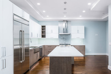 Trendy kitchen photo in Seattle with flat-panel cabinets