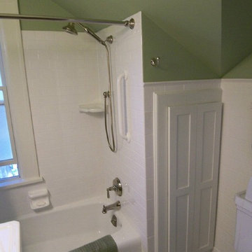 Recessed cabinet for storage, white grab bar to blend into tile