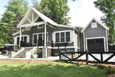 Mid-sized arts and crafts exterior home photo in Other