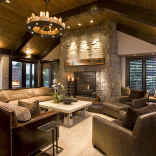 Photo of a country family room in Minneapolis with a stone fireplace surround.