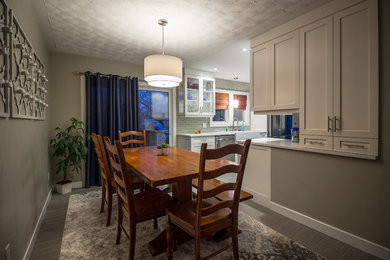 Example of a minimalist dining room design in Other